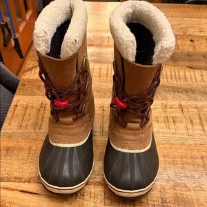 Sorel Tan and Black Winter Boots